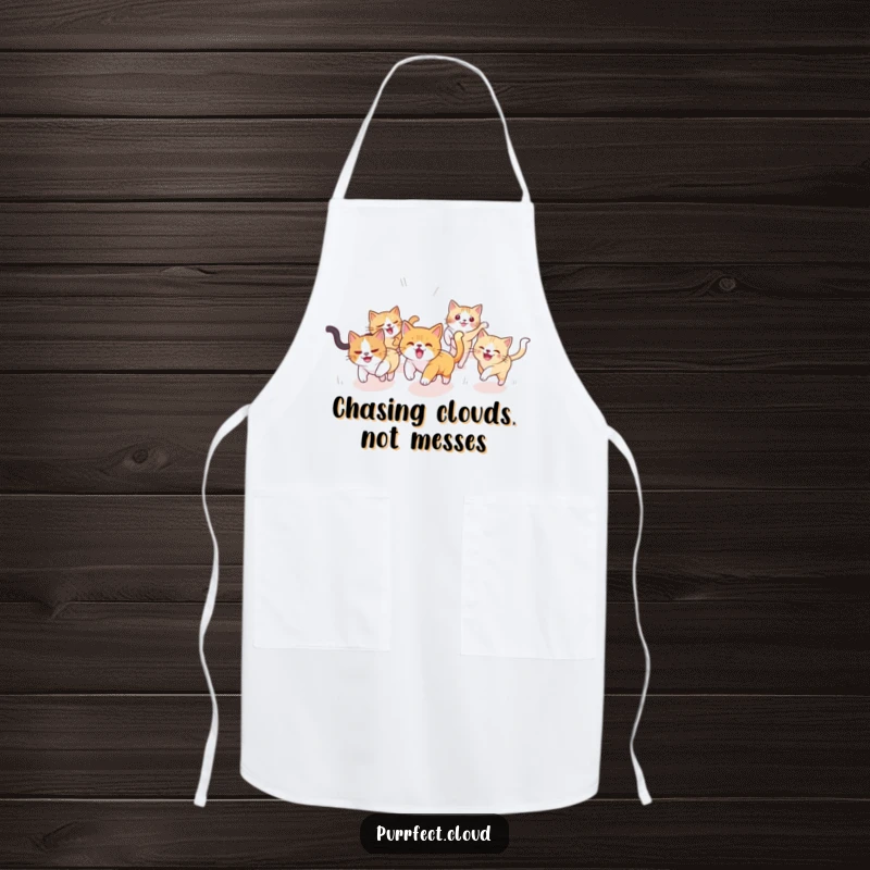 Funny Cat Apron: Playful cats chase each other across a whimsical cloudy sky, making kitchen duties more enjoyable and humorous, a practical gift.