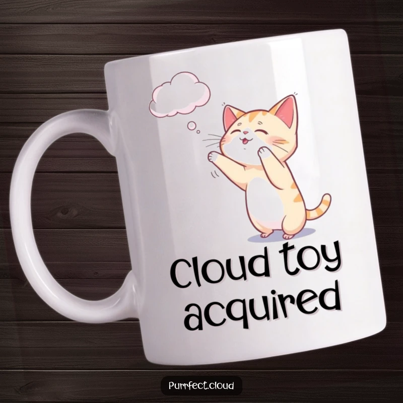 Funny cat mug showing a playful cat gently batting at a delicate, dangling wisp of cloud.