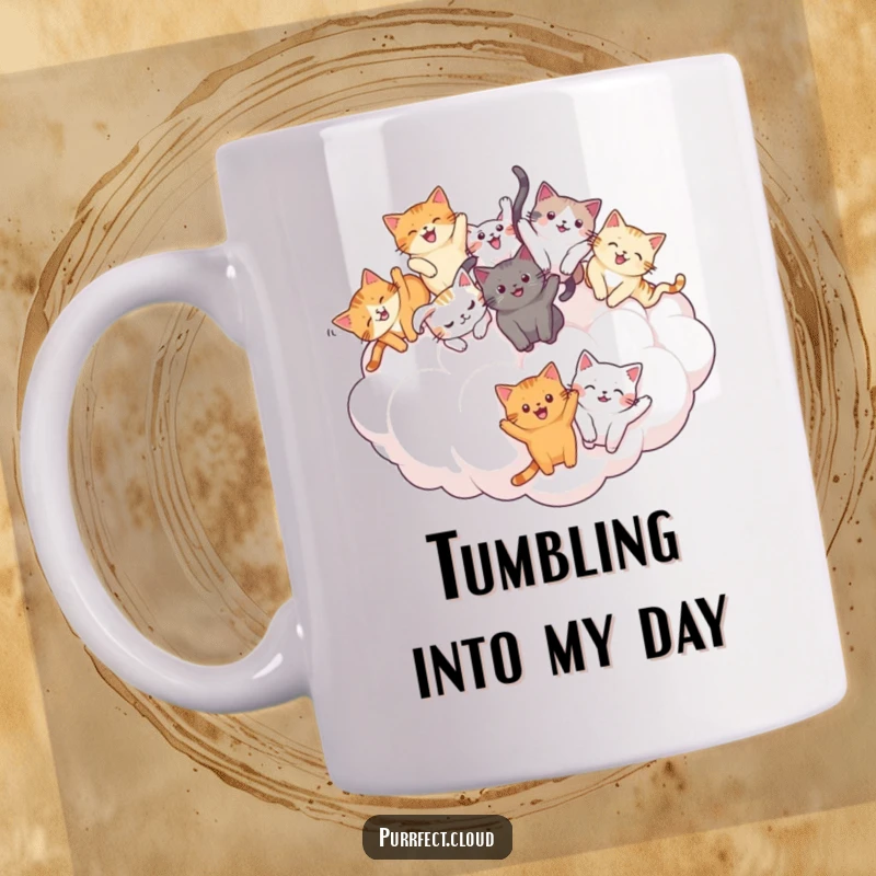 Funny Cat Tumble Mug: A group of cats tumbling joyfully on a large, puffy cloud, conveying playful chaos and happiness. A great funny gift.