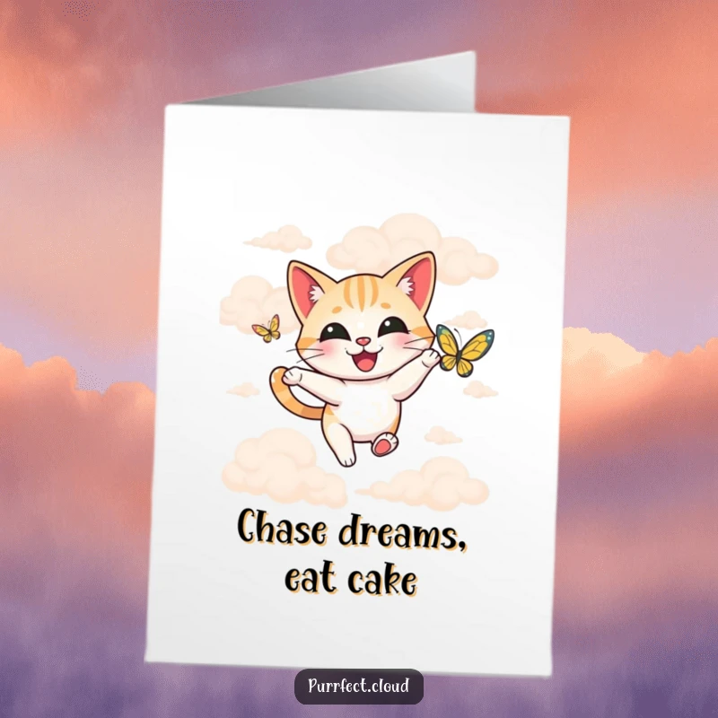 Funny Free Printable Birthday Card: A joyful cat leaps playfully after a colorful butterfly amidst dreamy, soft clouds.