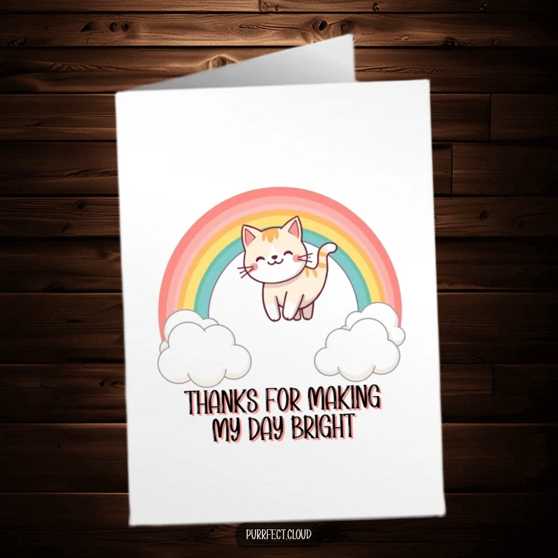 Funny Free Printable Thank You Card featuring a happy cat sliding down a colorful rainbow over white clouds.