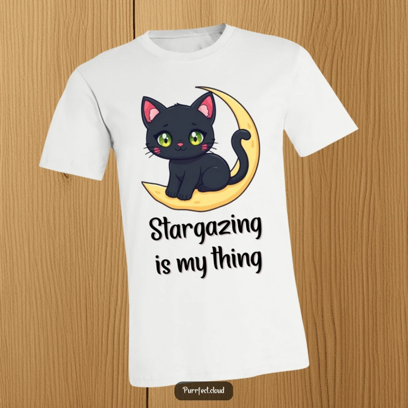 A black cat character with sparkling eyes sitting on a crescent moon cloud, featured on a comfortable and funny t-shirt.