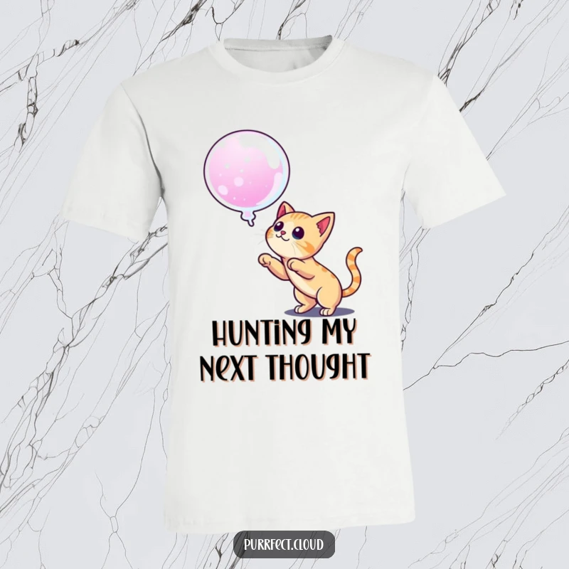 Funny t-shirt depicting a cat ready to pounce on a dream bubble, symbolizing ambition and the pursuit of aspirations with humor.