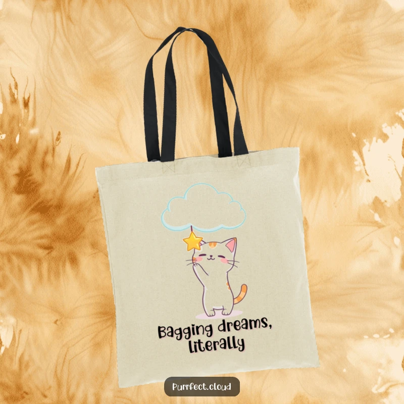 Funny Playful Cat Tote Bag illustrating a cat batting at a star from a cloud, a whimsical and fun accessory.
